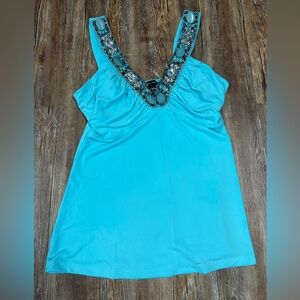 Blue beaded top with rhinestones and gems. Size: XS